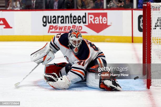 Mike Smith of the Edmonton Oilers gives up a goal to Josh Manson of the Colorado Avalanche during the second period in Game Two of the Western...