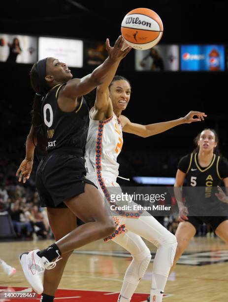 Jackie Young of the Las Vegas Aces steals the ball from DeWanna Bonner of the Connecticut Sun during their game at Michelob ULTRA Arena on June 02,...