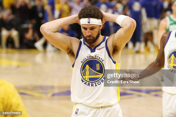 Klay Thompson of the Golden State Warriors reacts during the third quarter against the Boston Celtics in Game One of the 2022 NBA Finals at Chase...