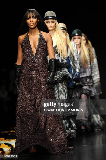 Model Naomi Campbell displays a creation as part of Roberto Cavalli Fall-winter 2012-2013 show on February 27, 2012 during the Women's fashion week...