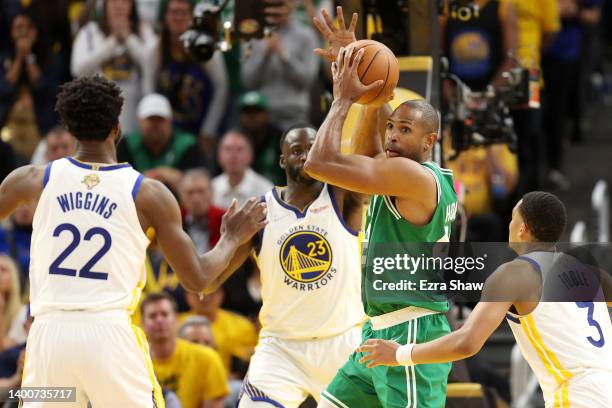Al Horford of the Boston Celtics looks to pass against the Golden State Warriors during the fourth quarter in Game One of the 2022 NBA Finals at...