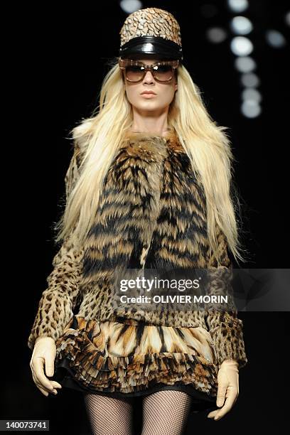 Model displays a creation as part of Roberto Cavalli Fall-winter 2012-2013 show on February 27, 2012 during the Women's fashion week in Milan. AFP...