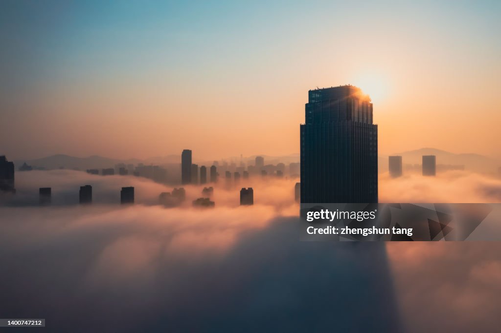 Aerial view of office building in cloud.