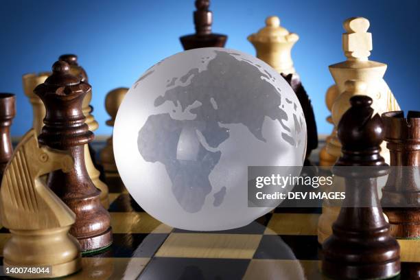 globe on chess board - glass map india stock pictures, royalty-free photos & images