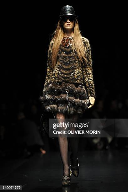 Model displays a creation as part of Roberto Cavalli Fall-winter 2012-2013 show on February 27, 2012 during the Women's fashion week in Milan. AFP...