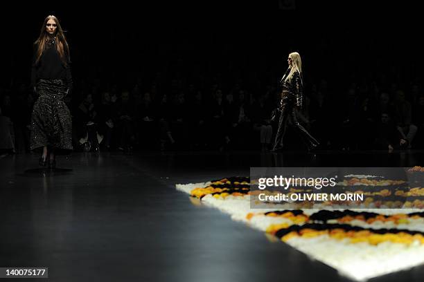 Model displays a creation as part of Roberto Cavalli Fall-winter 2012-2013 show on February 27, 2012 during the Women's fashion week in Milan. AFP...