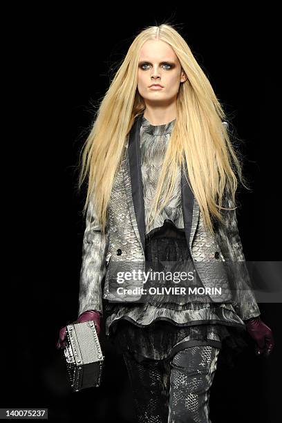 Model displays a creation as part of Roberto Cavalli Fall-winter 2012-2013 show on February 27, 2012 during the Women's fashion week in Milan. AFP...