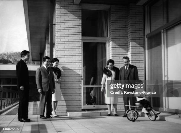 The imperial family Crown Prince Akihito, Prince Hitachi, Crown Princess Michiko, Empress Nagako, Emperor Hirohito and Prince Nruhito celebrate...