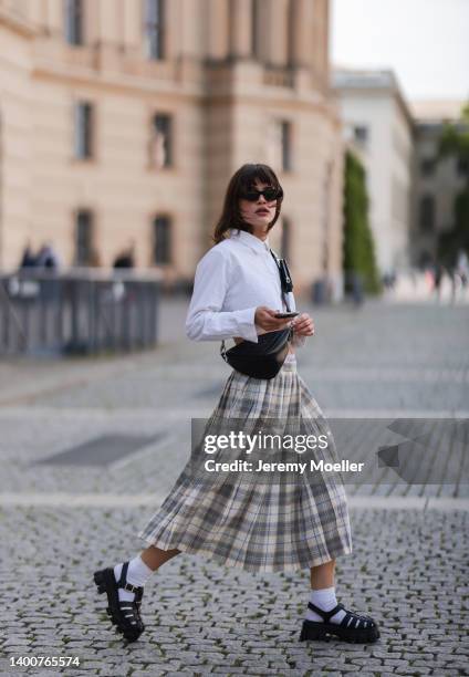 Lea Naumann wearing vintage midi skirt, Calvin Klein shorts, Tom Tailor cropped white flanell, Prada black sandals with with socks, Prada Triangle...