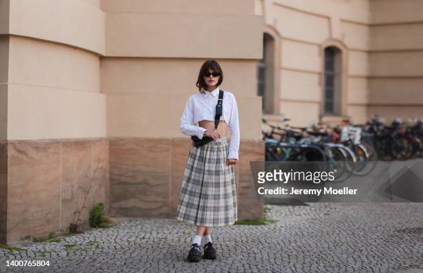 Lea Naumann wearing vintage midi skirt, Calvin Klein shorts, Tom Tailor cropped white flanell, Prada black sandals with with socks, Prada Triangle...