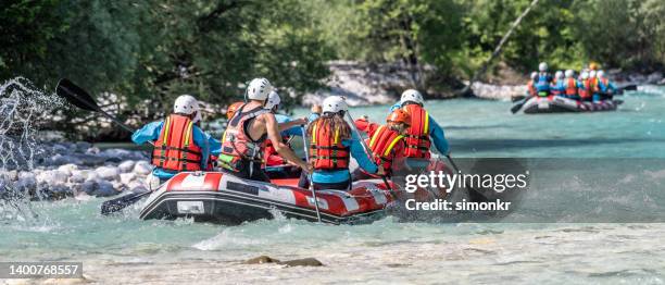 Person Rowing A Raft Group Of People Rowing Their Raft In River High-Res Stock Photo - Getty ...