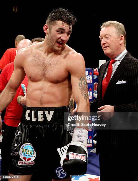 Nathan Cleverly celebrates with Frank Warren after his victory in his WBO Light-Heavyweight Championship bout against Tommy Karpency at the...