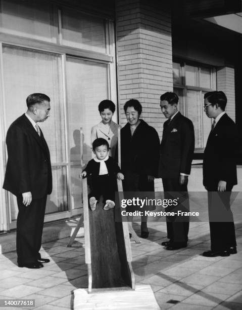 The imperial family of Japan poses for the New Year photograph at their new palace in Tokyo, Japan, on December 27, 1961 - From left to right:...