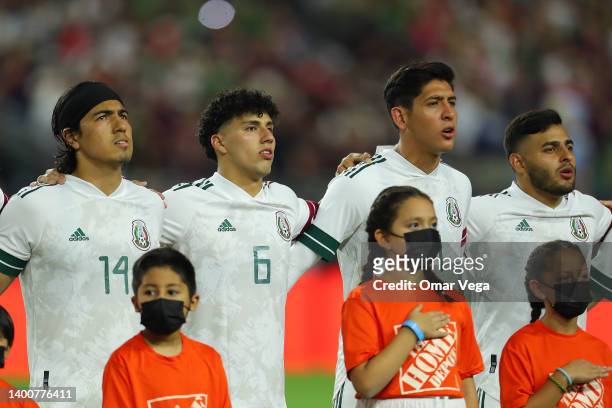 Mexico players Erick Gutiérrez, Jorge Sánchez, Edson Álvarez and Alexis Vega of Mexico stand for their national anthem before to the friendly match...