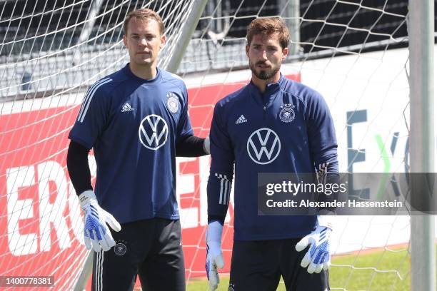 Manuel Neuer stands next to Kevin Trapp during a training session of the German national soccer team at Adi-Dassler-Stadion of adidas Herzo Base...