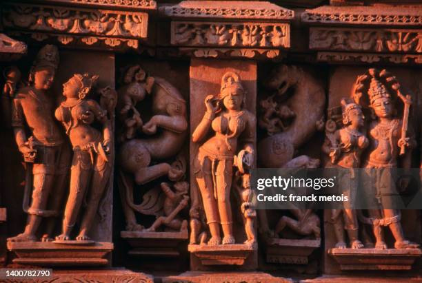 sculptures in the khajuraho temple ( india) - khajuraho stock pictures, royalty-free photos & images