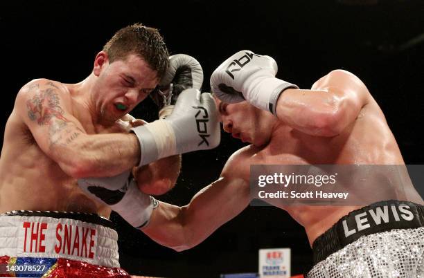 Lewis Ress in action with Tony Pace during their Light-Welterweight bout at the Motorpoint Arena on February 25, 2012 in Cardiff, Wales.