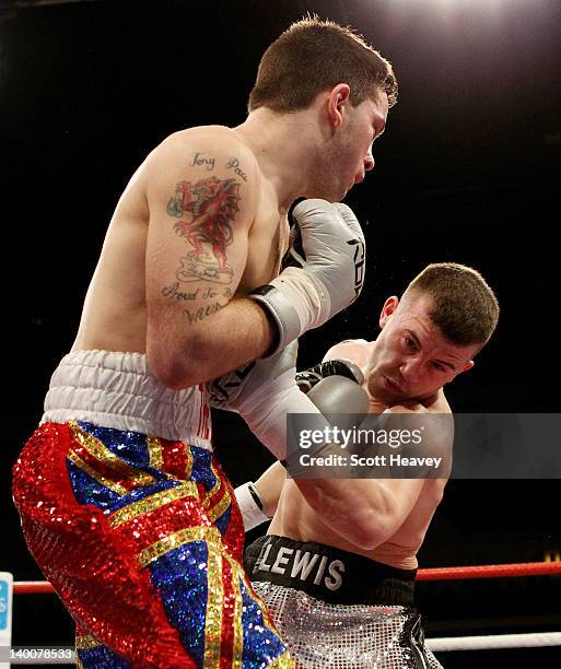 Lewis Ress in action with Tony Pace during their Light-Welterweight bout at the Motorpoint Arena on February 25, 2012 in Cardiff, Wales.