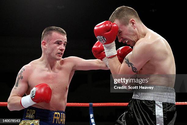 Frankie Gavin connects with Kevin McIntyre during their Welterweight bout at the Motorpoint Arena on February 25, 2012 in Cardiff, Wales.