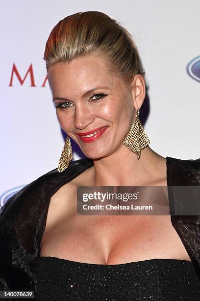 Actress Natasha Henstridge arrives at the Maxim late night party with Ford Mustang Customizer on February 26, 2012 in Los Angeles, California.