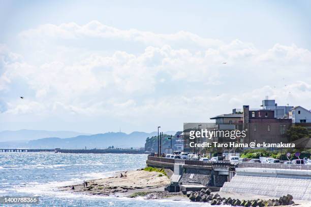 summer clouds over the beach in kanagawa of japan - prefettura di kanagawa foto e immagini stock