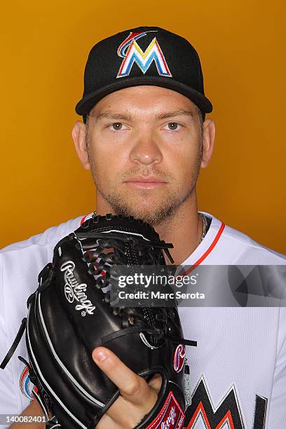 Pitcher Josh Johnson of the Miami Marlins poses for photos during media day at Roger Dean Stadium on February 27, 2012 in Jupiter, Florida.