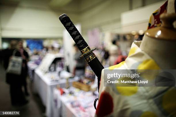 Kimono and replica katana on display at a stand at the Hyper Japan 2012 Event at the Earls Court Exhibition Centre on February 24, 2012 in London,...