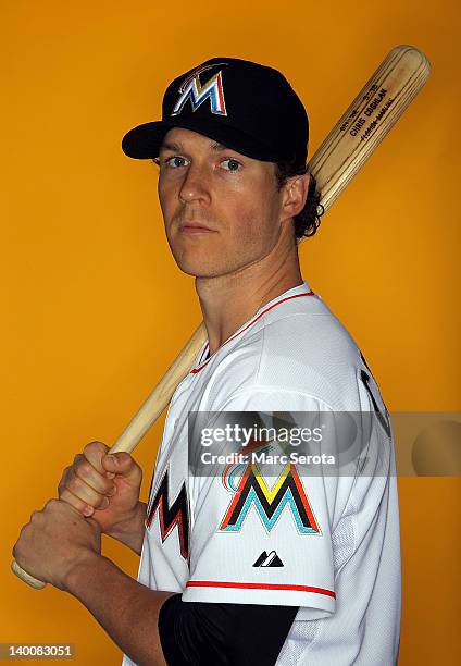 Outfielder Chris Coghlan of the Miami Marlins poses for photos during media day at Roger Dean Stadium on February 27, 2012 in Jupiter, Florida.