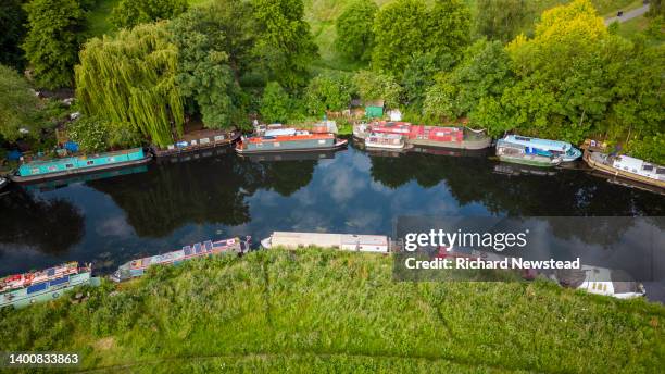 river lea houseboats - anchored concept stock pictures, royalty-free photos & images