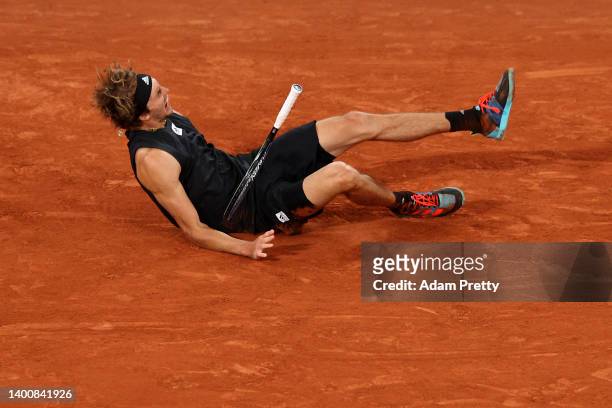 Alexander Zverev of Germany falls following an injury against Rafael Nadal of Spain during the Men's Singles Semi Final match on Day 13 of The 2022...