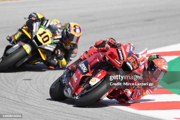 Francesco Bagnaia of Italy and Ducati Lenovo Team leads Luca Marini of Italy and Mooney VR46 Racing Team during the MotoGP of Catalunya - Free...