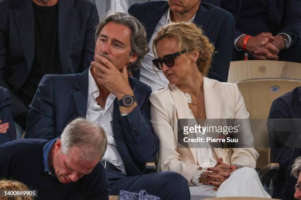 Caroline Roux and Laurent Solly are seen at Roland Garros on June 03, 2022 in Paris, France.