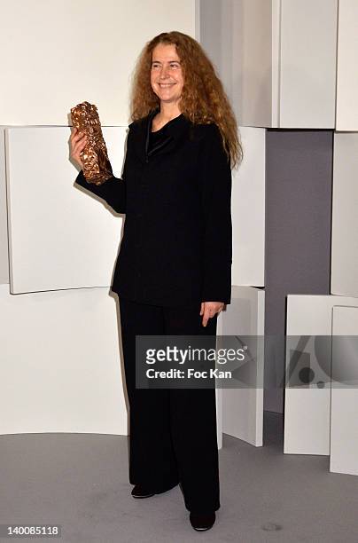 Anais Roman Poses after receiving the Cesar Award for the Best costume designer for L' Appolonide during the 37th Cesar Film Awards at Theatre du...