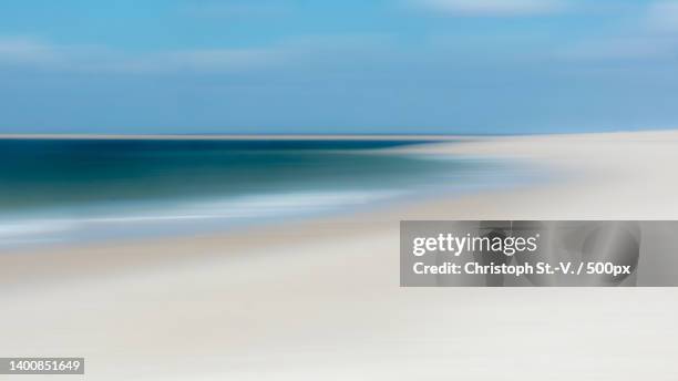 scenic view of beach against sky,sylt,germany - sylt stock-fotos und bilder