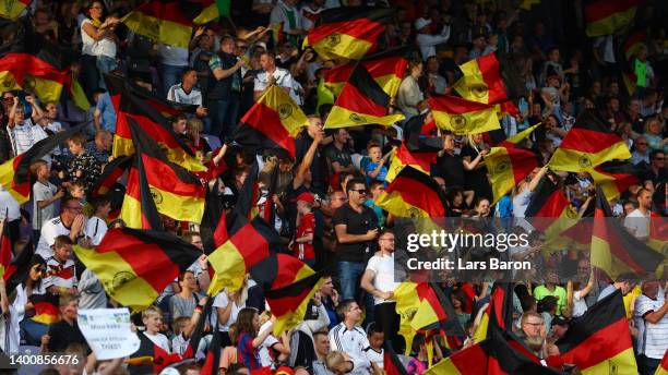 Fans of Germany U21 wave their flags to celebrate their team's fourth goal scored by Lazar Samardzic during the UEFA European Under-21 Championship...