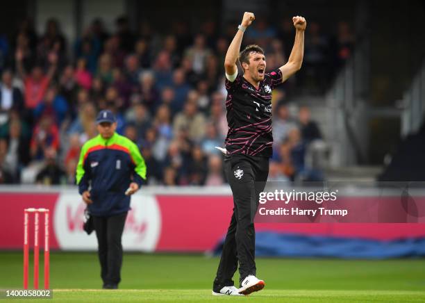 Craig Overton of Somerset celebrates the wicket of David Lloyd of Glamorgan during the Vitality T20 Blast match between Somerset and Glamorgan at The...