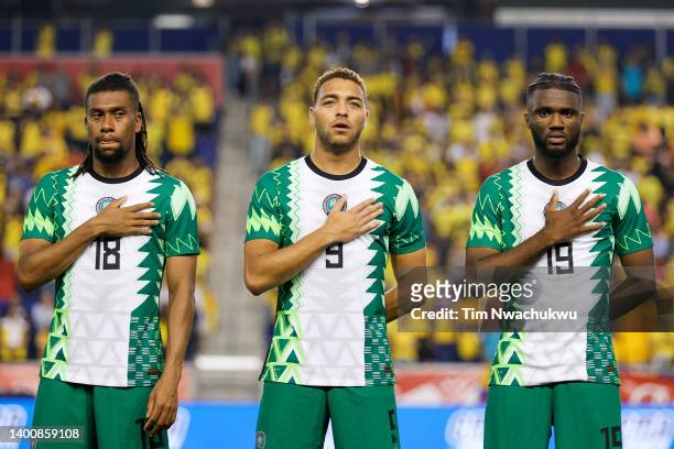 Alex Iwobi, Cyriel Dessers and Terem Moffi of Nigeria look on before playing a Ecuador at Red Bull Arena on June 02, 2022 in Harrison, New Jersey.