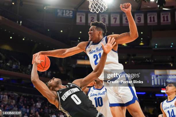 Ike Obiagu of the Seton Hall Pirates blocks the shot of Aminu Mohammed of the Georgetown Hoyas during the First Round of the 2022 Big East Men's...