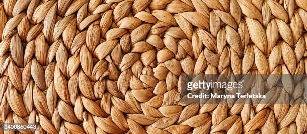 woven round rug made of natural straw. - jute stock pictures, royalty-free photos & images