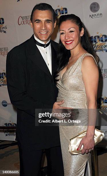 Actor Adrian Paul and costume designer Alexandra Tonelli arrives for Norby Walters' 22nd Annual Night Of 100 Stars Oscar Viewing Gala held at The...