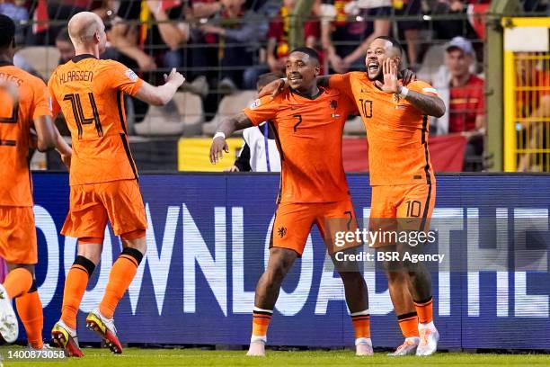 Memphis Depay of the Netherlands celebrates with Steven Bergwijn of the Netherlands after scoring his sides second goal during the UEFA Nations...