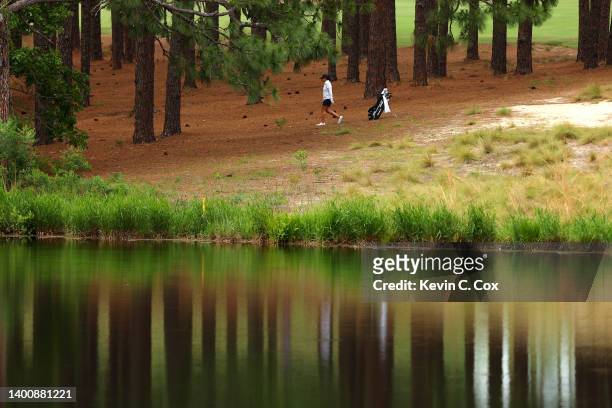 Beth Wu prepares to play a shot from the rough on the tenth hole during the second round of the 77th U.S. Women's Open at Pine Needles Lodge and Golf...