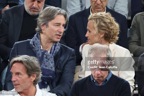 Laurent Solly and Caroline Roux attend the French Open 2022 at Roland Garros on June 03, 2022 in Paris, France.