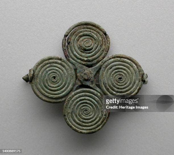 Quatrefoil spiral fibula , 7th century BCE. Artist Unknown.