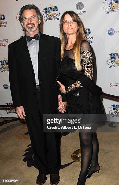 Actor Robert Carradine and wife Edie Mani arrive for Norby Walters' 22nd Annual Night Of 100 Stars Oscar Viewing Gala held at The Beverly Hills Hotel...