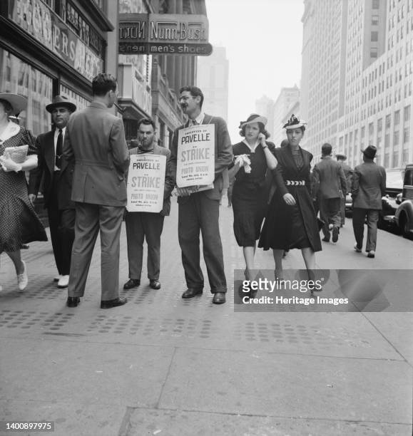 New York City. Four firms on 42nd Street in block east of Fifth Avenue were being picketed in this manner on this afternoon. [Placards: 'Employees of...