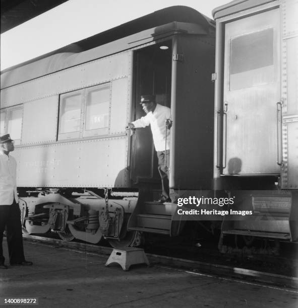 Railroad yards, Kearney, Nebraska. [Black Pullman porters]. Artist Dorothea Lange.