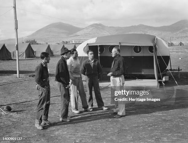 Four young migratory potato pickers, travelling together, come into camp to ask manager whether they would be eligible for a hot bath. "Sure, boys,...