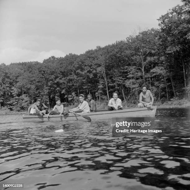 Southfields, New York. Interracial activities at Camp Nathan Hale, where children are aided by the Methodist Camp Service. Boating on the lake....