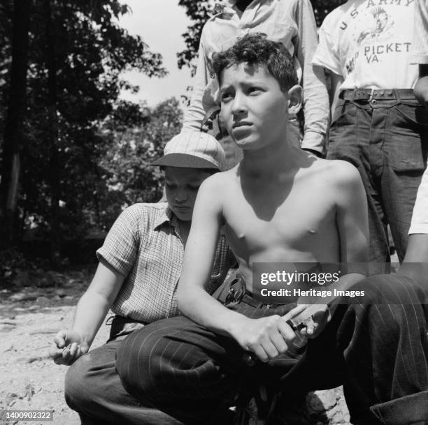 Southfields, New York. Interracial activities at camp Nathan Hale, where children are aided by the Methodist Camp Service. "Aw nuts". Artist Gordon...